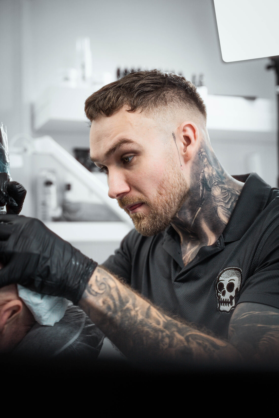Jack working on a client's hairline at Sharp SMP